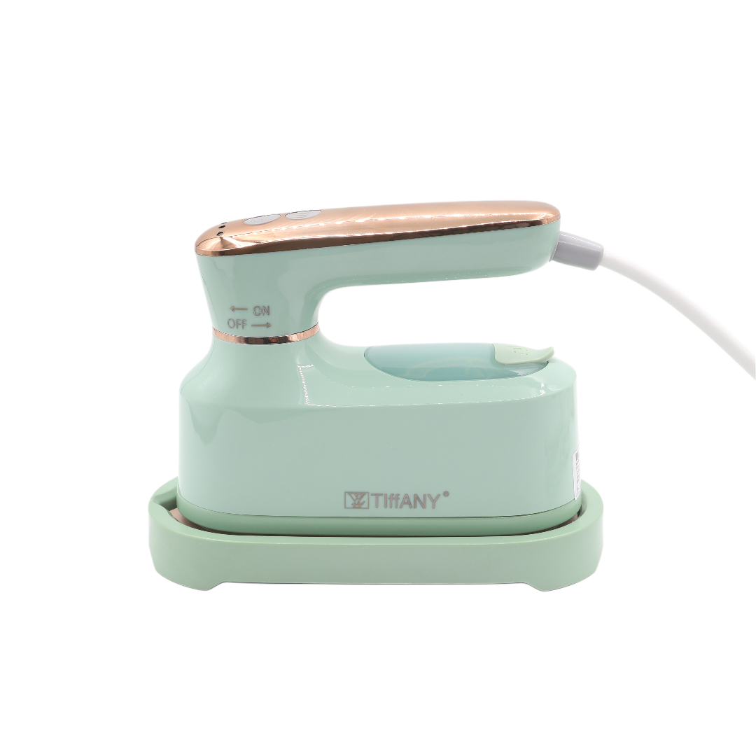 Aparat de călcat cu aburi Tiffany TF-2102B, turcoaz deschis, plastic, cu suport, 140 ml, 2000 W, 17 x 7 x 13 cm